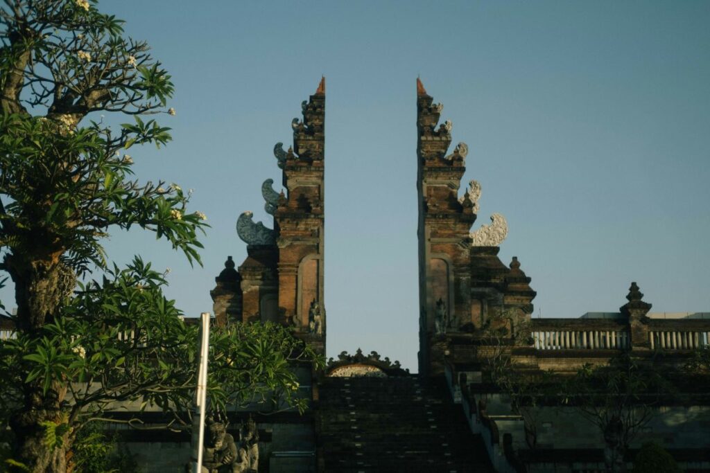Traditional Balinese temple gates with carvings