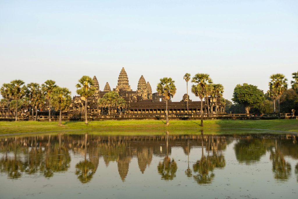 Angkor Wat towers reflected in the sunrise pool in Cambodia