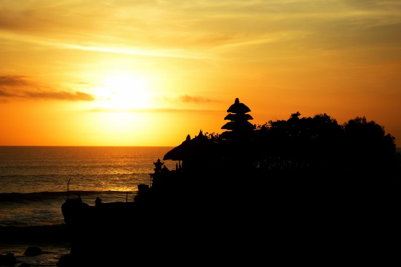 Couple enjoying sunset in Bali on luxury vacation