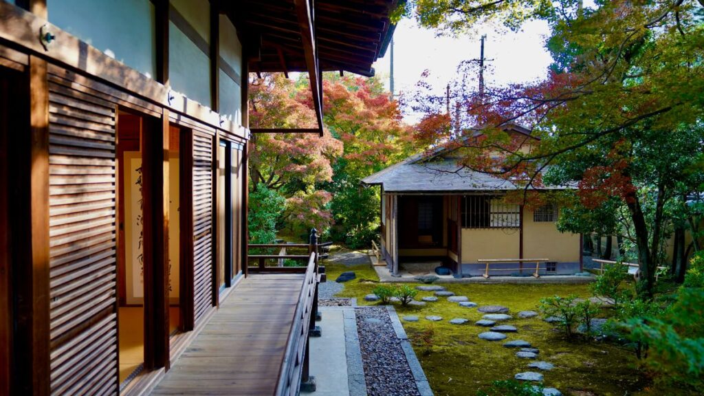Luxury Kyoto ryokan room with tatami mats and garden view
