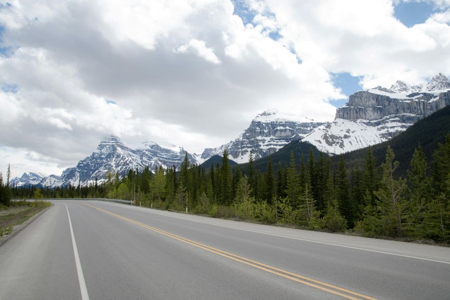 Snowy Banff Avenue with mountain views during a romantic winter trip
