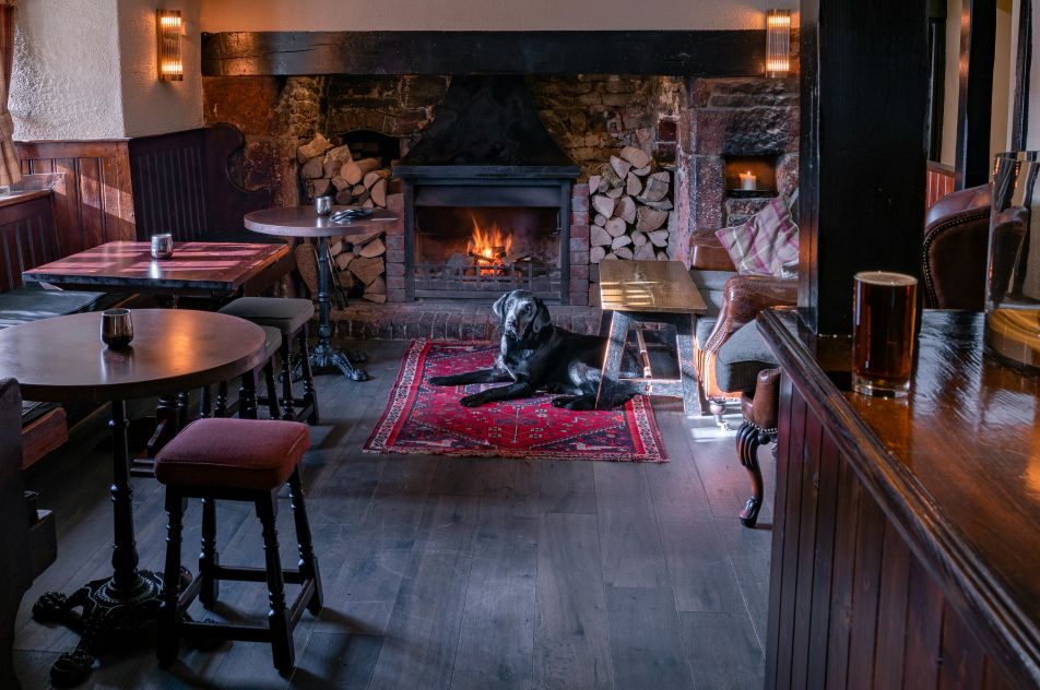 Cozy countryside pub interior with fireplace