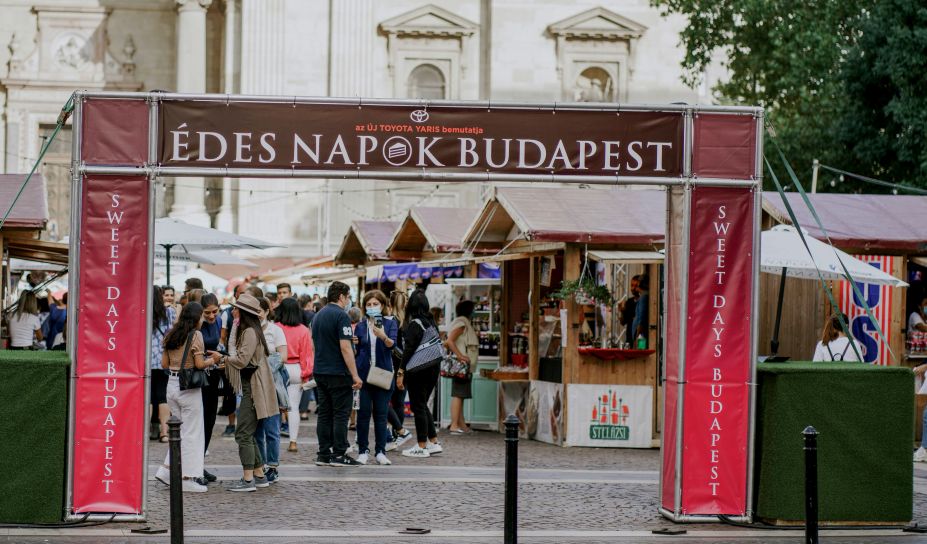 Couple exploring Budapest food experiences with a local guide.
