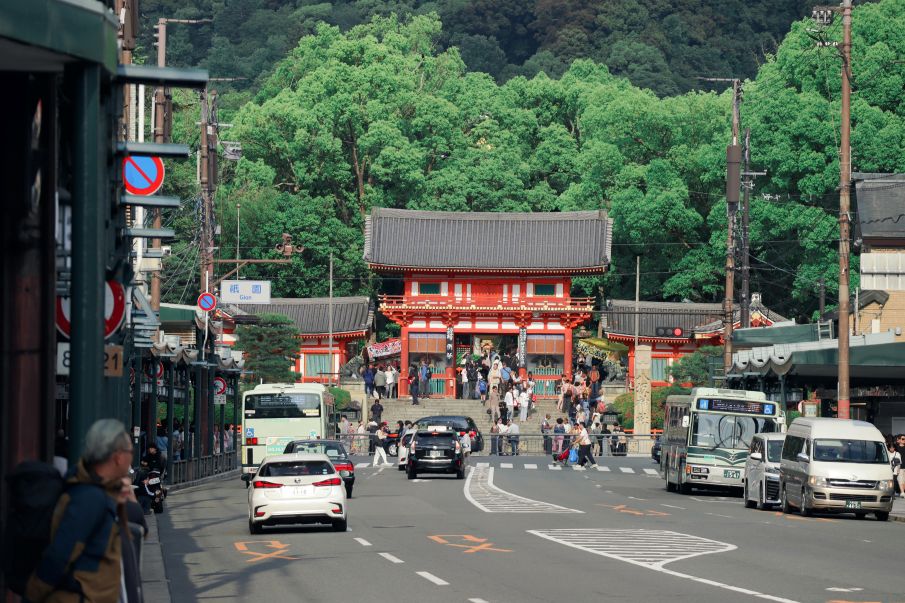 Crowded Kyoto temple street showing why smart timing matters