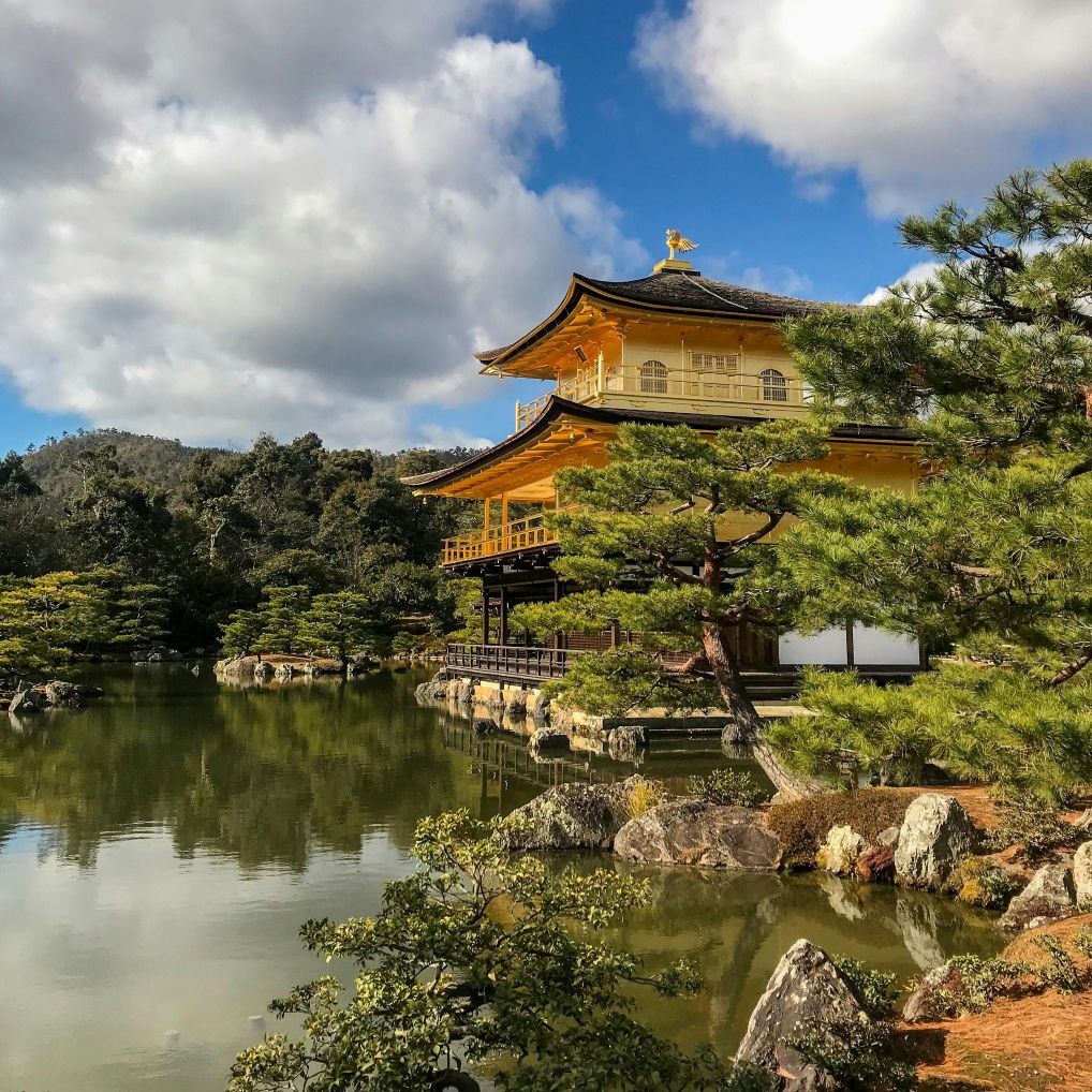 Luxury ryokan exterior in Kyoto with traditional garden