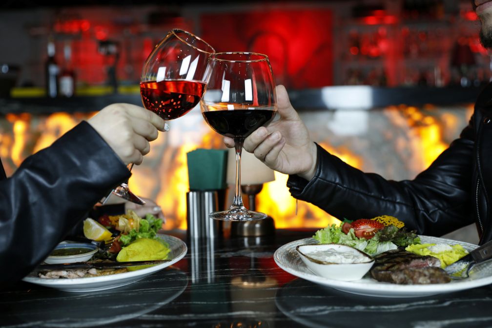 Couple enjoying an elegant Budapest food and wine experience.