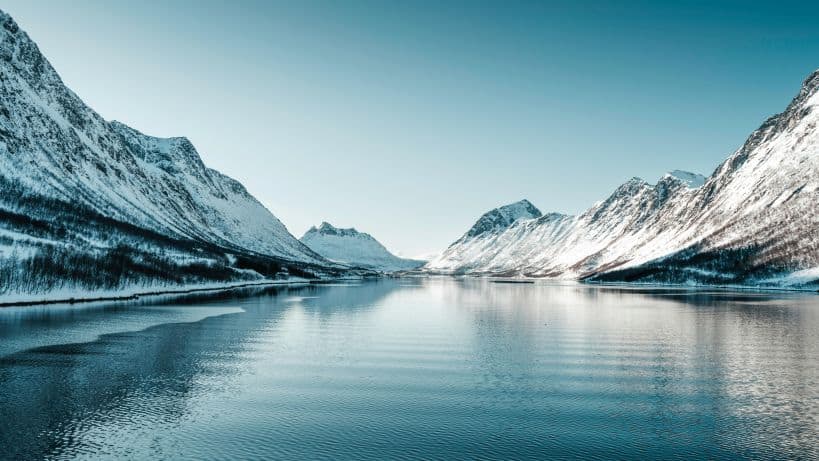 Scenic Norwegian fjord landscape showing seasonal beauty for travelers