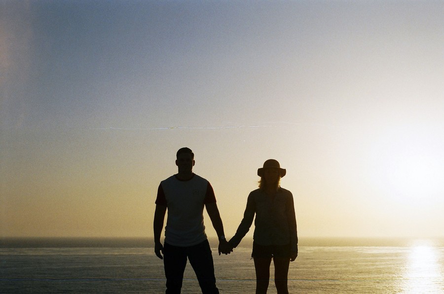 A couple enjoys a slow walk during their first empty nest trip.