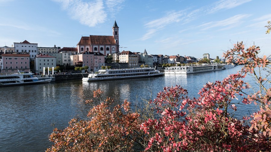 Danube River cruise passengers taking a guided walking tour through Vienna.