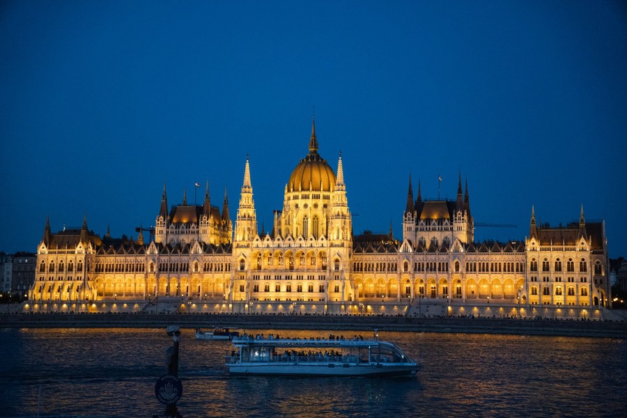 [Private transfer service helping river cruise guests with luggage before a Danube cruise]