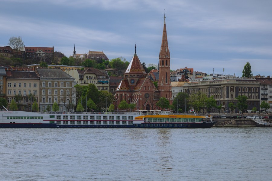 French balcony cabin on a Danube River cruise ship with vineyard views outside