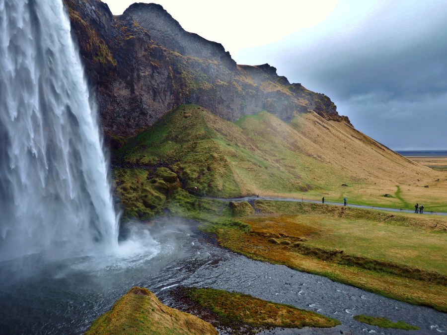 Couple over 50 viewing Gullfoss waterfall during a scenic Iceland Golden Circle trip.