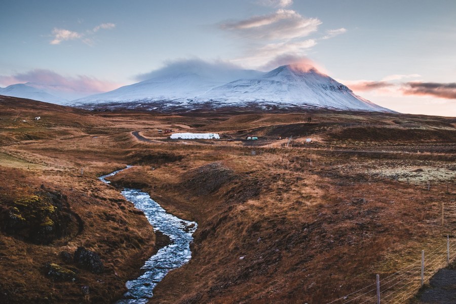Couple joining a guided Iceland excursion from Reykjavik for a comfortable sightseeing day.